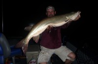 Here's Mike with 1 of his 2 fish of the night after a storm rolled through. 