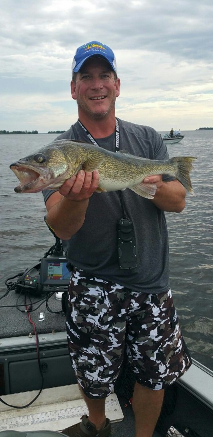 Mike-Neumann-with-a-walleye